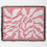 Lighter red abstract Matisse throw blanket full flat lay on a white background