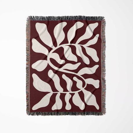 Red leaf abstract Matisse throw blanket with white abstract pattern on a red-white background