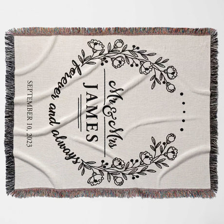 Mr and Mrs cotton wedding anniversary gift woven blanket flat lay with floral design and text 'Mr & Mrs Forever and always' on a white background