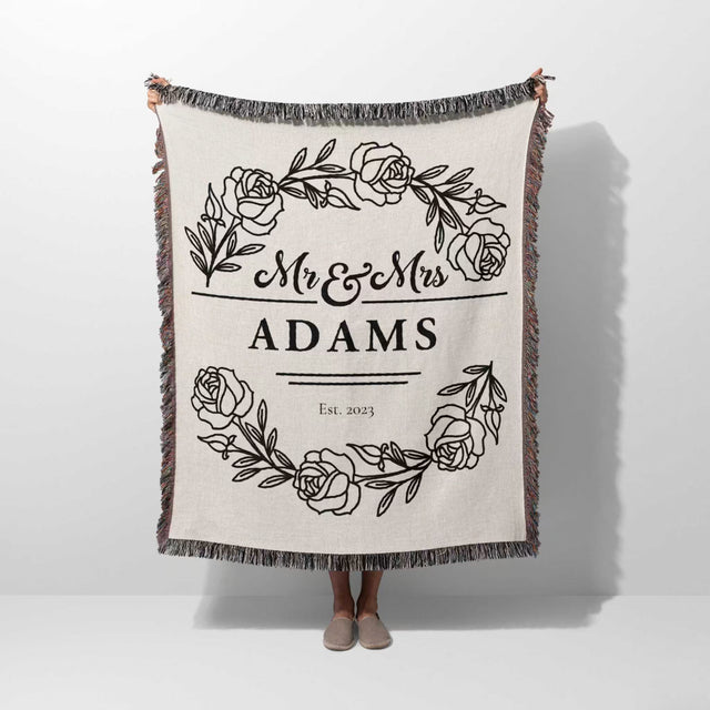 Personalized 2 year anniversary gift - Mr and Mrs woven throw blanket with 'Mr & Mrs Adams' design on a white background