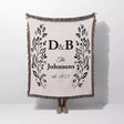 Personalized gift for couple unique cotton anniversary gift woven blanket held by a person on a white background