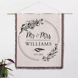 Personalized woven throw blanket wall hanging with 'Mr & Mrs Williams' text on a neutral background