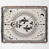 This Pisces Zodiac Blanket features a beautifully woven black and white design showcasing the Pisces fish and zodiac symbol. It makes a unique birthday gift for women and men, adding a celestial charm to home decor.