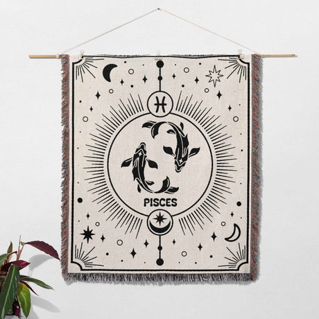 Hung as wall art, the Pisces Zodiac Blanket serves as a stunning decor piece. Its detailed black and white design makes it a standout birthday gift for women and men.