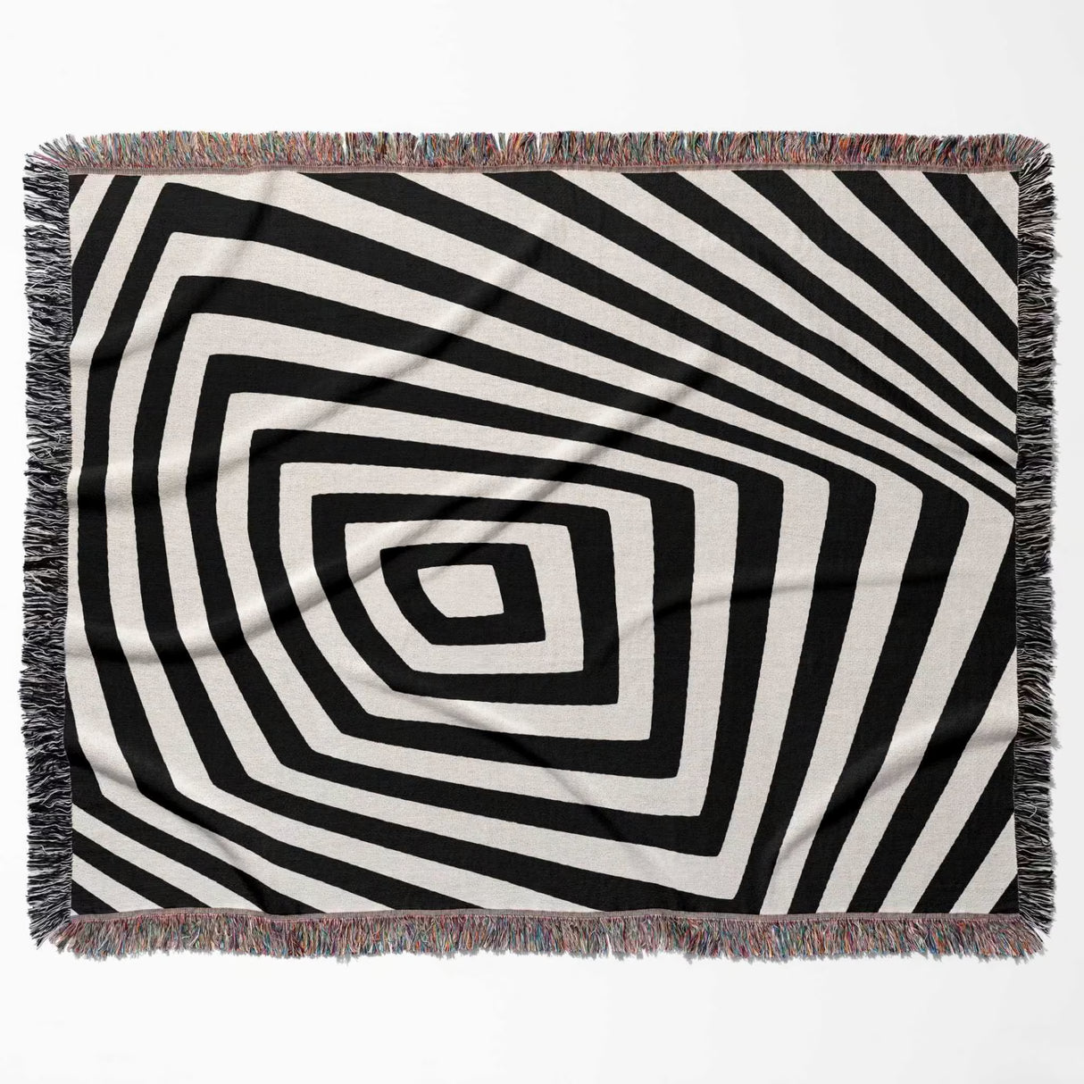 Psychedelic abstract art woven blanket throw tapestry with fringe flat lay on a white background.