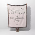 Romantic anniversary custom name blanket with 'The Richardson family' text and heart string design on a white background