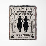 Romantic cowboy and cowgirl cotton anniversary gift – woven throw blanket full view with cowboy silhouette design and personalized text on a white background
