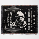 Romantic western 2nd anniversary gift - woven throw blanket flat lay with white horse design, text, and fringes on a gray background