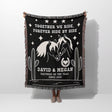 Romantic western 2nd anniversary gift - woven throw blanket with horse design and text held by a person on a white background