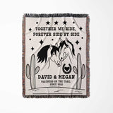 Romantic western cotton anniversary gift - woven throw blanket full view with horse design, text, and cacti on a white background