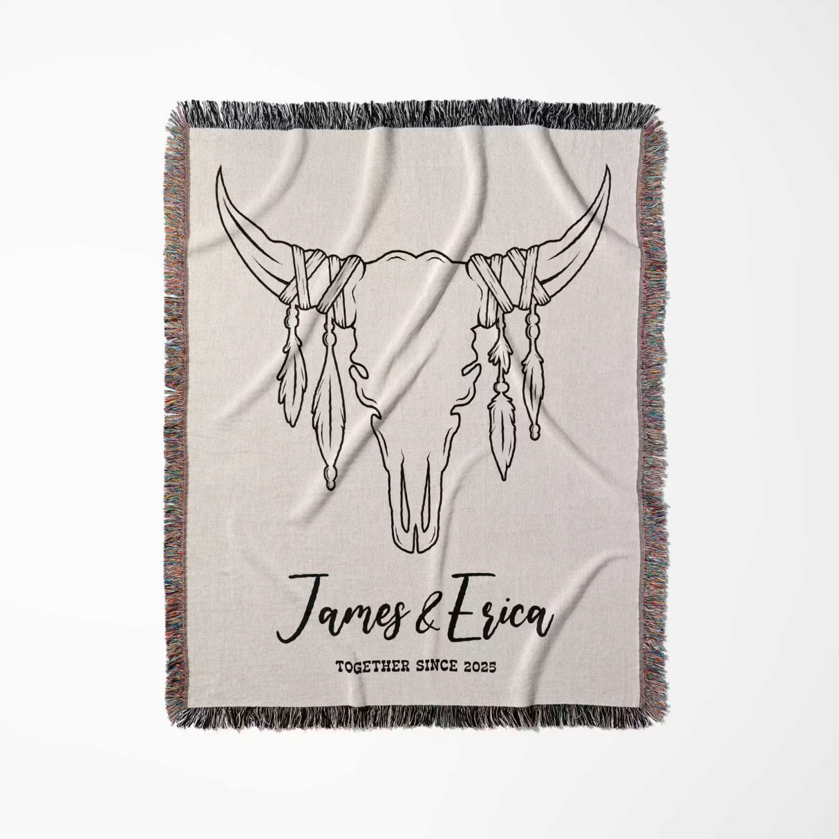 Rustic bull skull cotton anniversary gift woven throw blanket full view with bull skull design and personalized text on a beige background