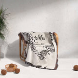 Rustic Mr and Mrs 2nd year anniversary gift woven throw blanket with floral and text design draped over a chair against a gray background