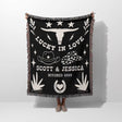 Rustic western 2nd anniversary gift woven throw blanket with white designs and text, featuring a longhorn skull and cowboy hats, on a white background.