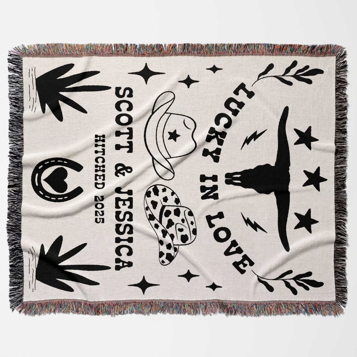 Rustic western cotton anniversary gift woven throw blanket flat lay with black graphics and text on a white background