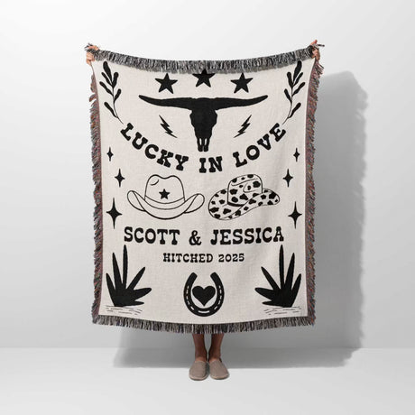 Rustic western cotton anniversary gift woven throw blanket with cowboy-themed design and text on a white background