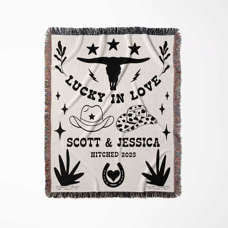 Rustic western cotton anniversary gift woven throw blanket full view with cowboy-themed design and text on a white background