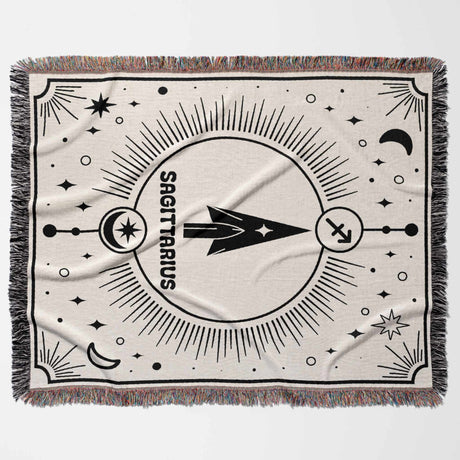     Displaying the Sagittarius Zodiac Blanket in a flat horizontal position, this image emphasizes the detailed zodiac design and multicolor fringes. The blanket's intricate patterns and high-quality woven texture  create a visually appealing and unique birthday gift idea for women and men. Ideal for astrology enthusiasts and home decor lovers.