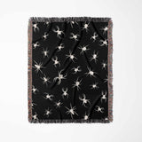 Spooky spiders halloween woven throw blanket on a white background
