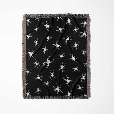 Spooky spiders halloween woven throw blanket on a white background