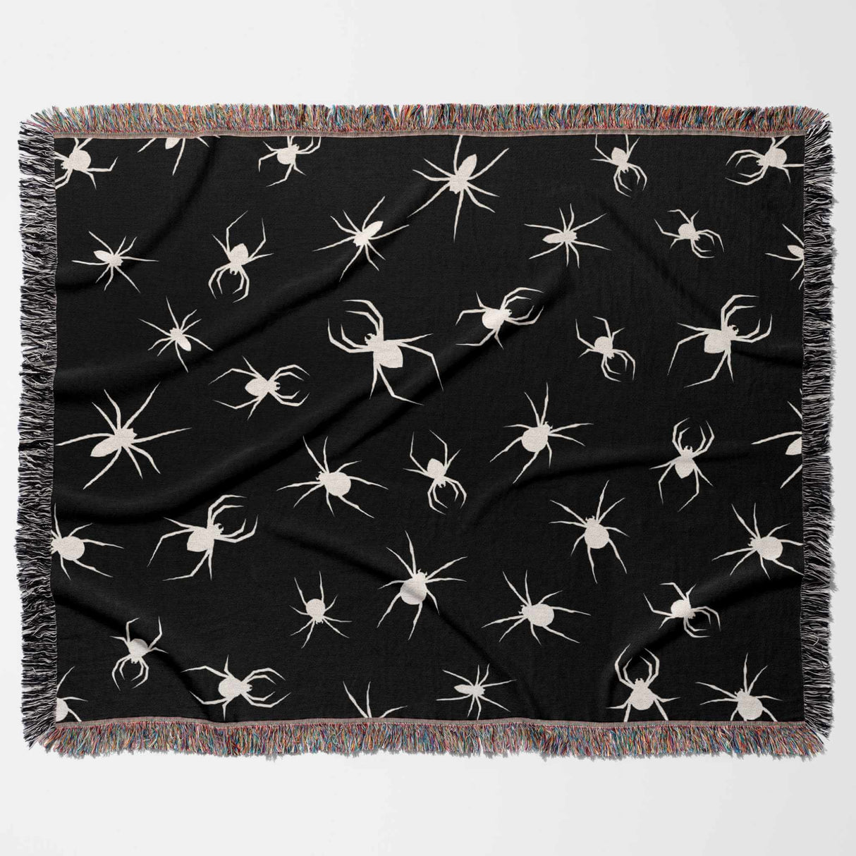 Spooky spiders halloween woven throw blanket full view on a white background.
