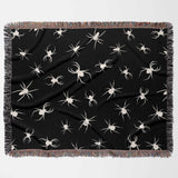Spooky spiders halloween woven throw blanket full view on a white background.