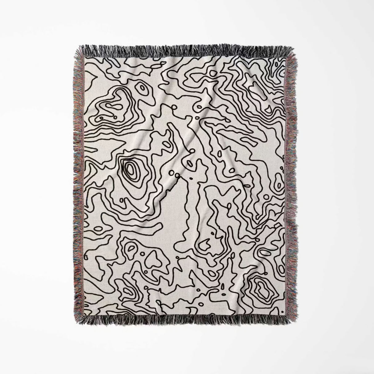Black and white topographic map design woven throw blanket full view on a white background.