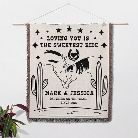 Two horses woven throw blanket cotton anniversary gift as a wall hanging with horses and text on a white background