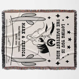 Two horses woven throw blanket cotton anniversary gift flat lay with black and white graphic design featuring text and a horse, on a light background.