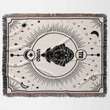 Horizontal flat lay of the Virgo Zodiac Blanket featuring a black and white woven tapestry with a detailed Virgo emblem surrounded by celestial elements. This blanket combines astrological elegance with cozy comfort, making it an ideal unique birthday gift.