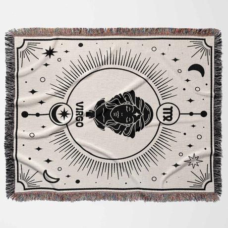 Horizontal flat lay of the Virgo Zodiac Blanket featuring a black and white woven tapestry with a detailed Virgo emblem surrounded by celestial elements. This blanket combines astrological elegance with cozy comfort, making it an ideal unique birthday gift.