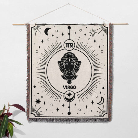 Virgo Zodiac Blanket used as wall decor, showcasing its intricate Virgo emblem and celestial designs. This woven tapestry is perfect for adding an astrological touch to your home as both a decorative piece and a cozy blanket.